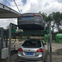 简易升降是机械车库。更适合家庭用。花一个车位钱，停两辆车